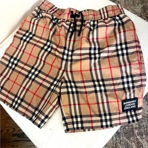 Burberry Kids Swim Trunks in Beige and Black.